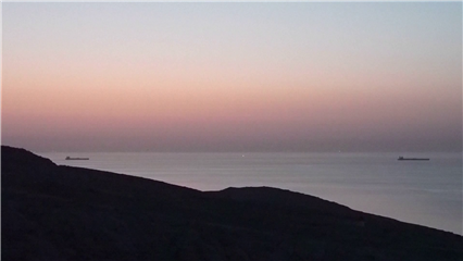 International News: Oil tanker towed toward Omani port after being hit in Strait of Hormuz